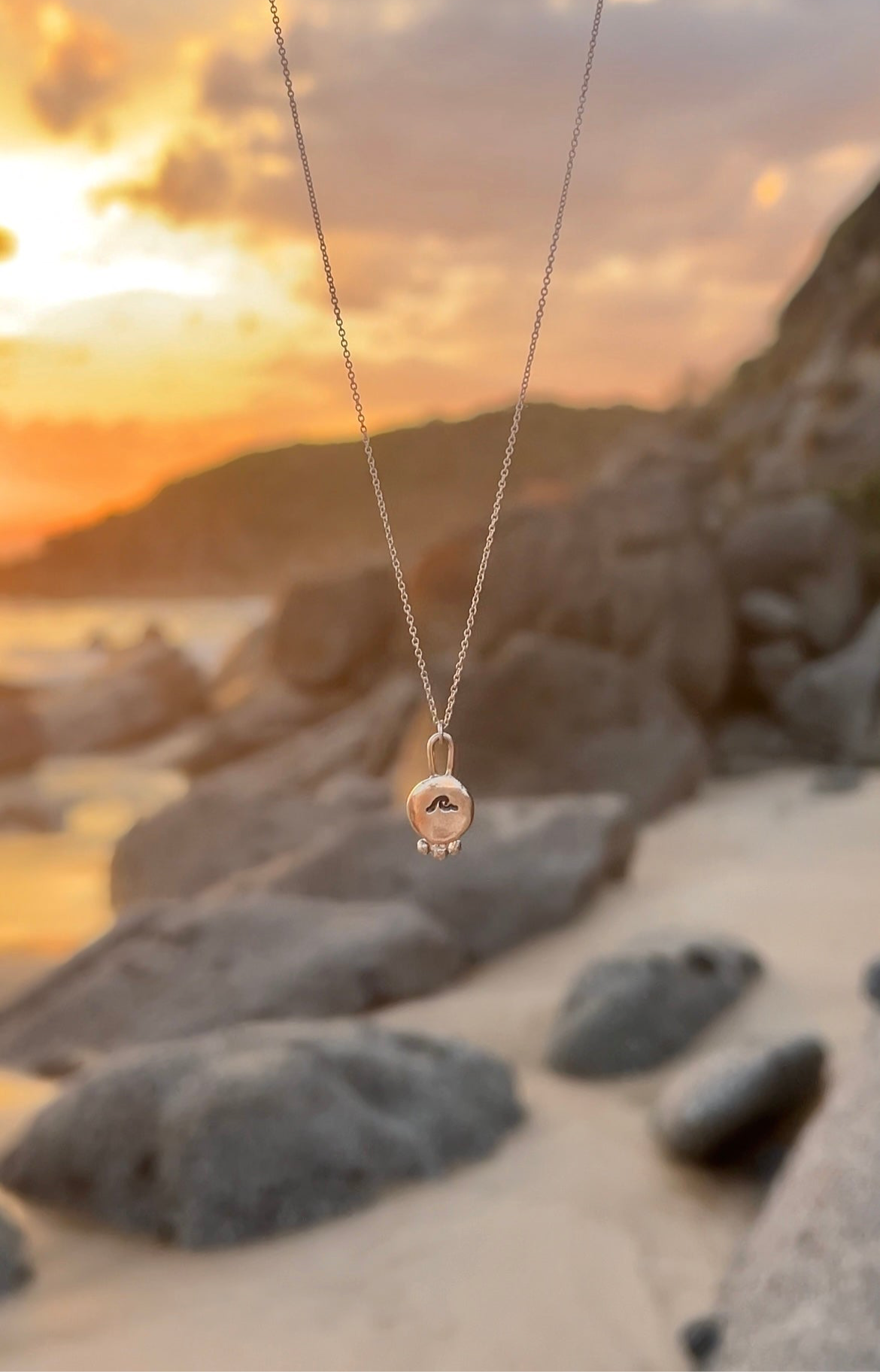 elemental wave pendant necklace