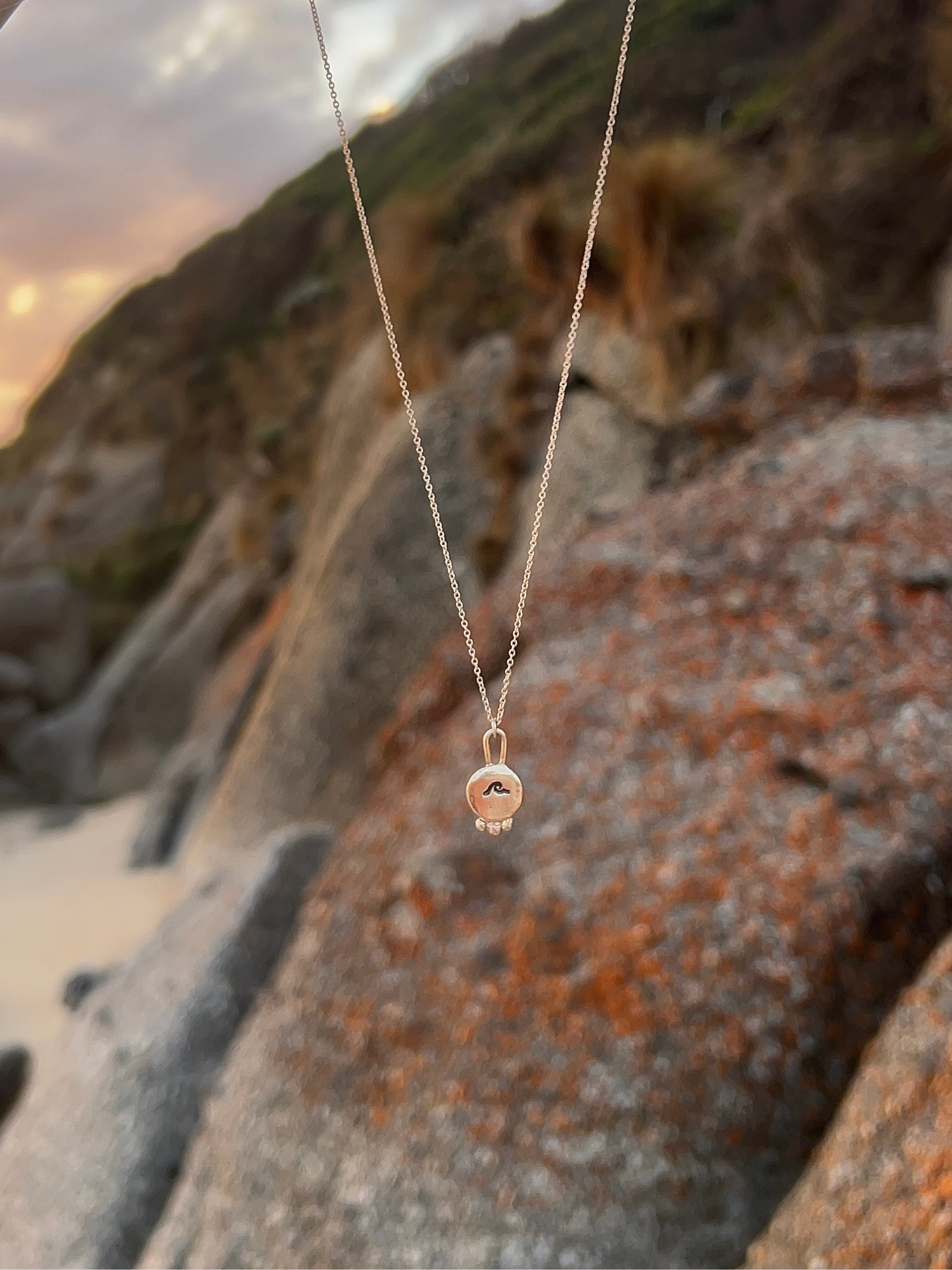 elemental wave pendant necklace