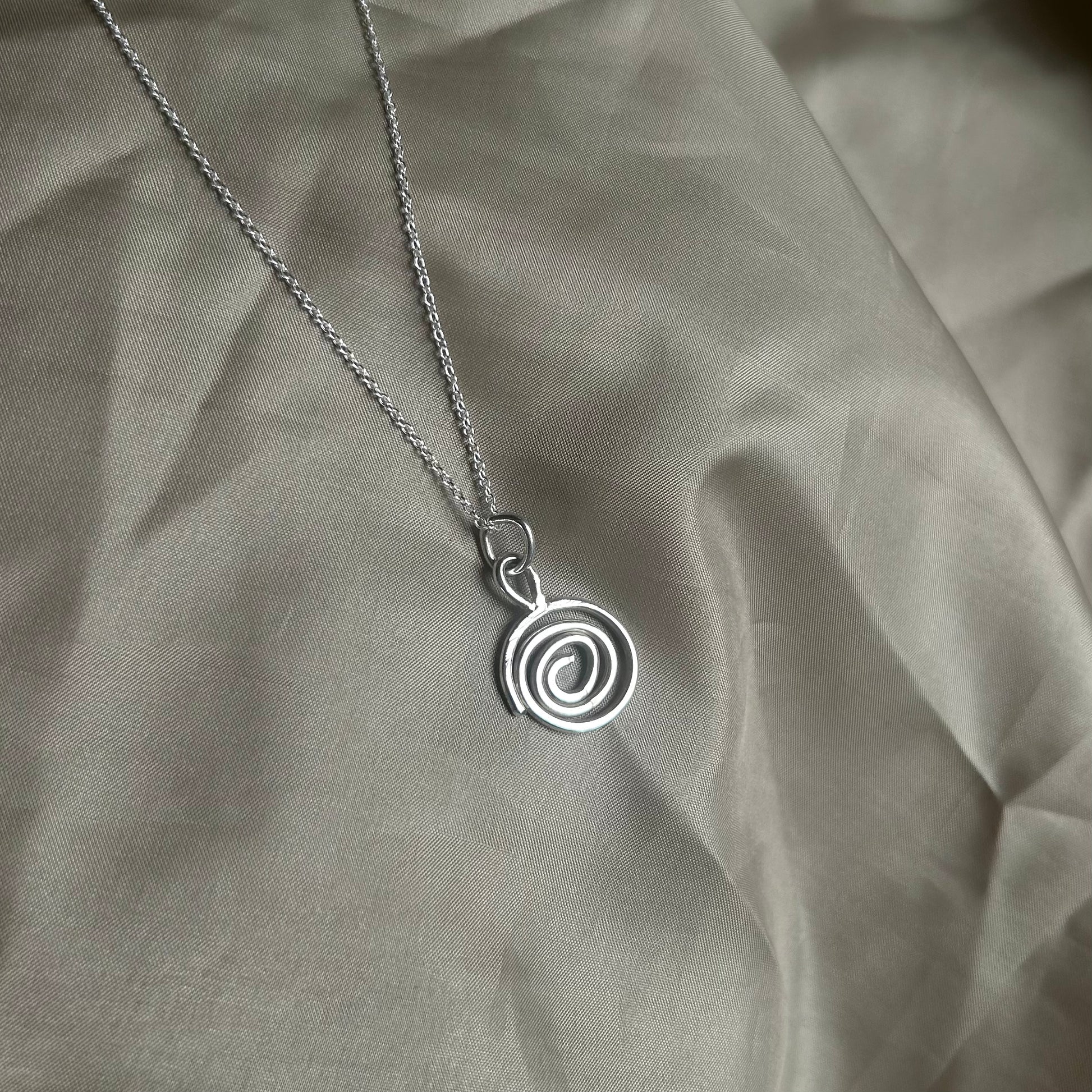 vortex swirl pendant necklace