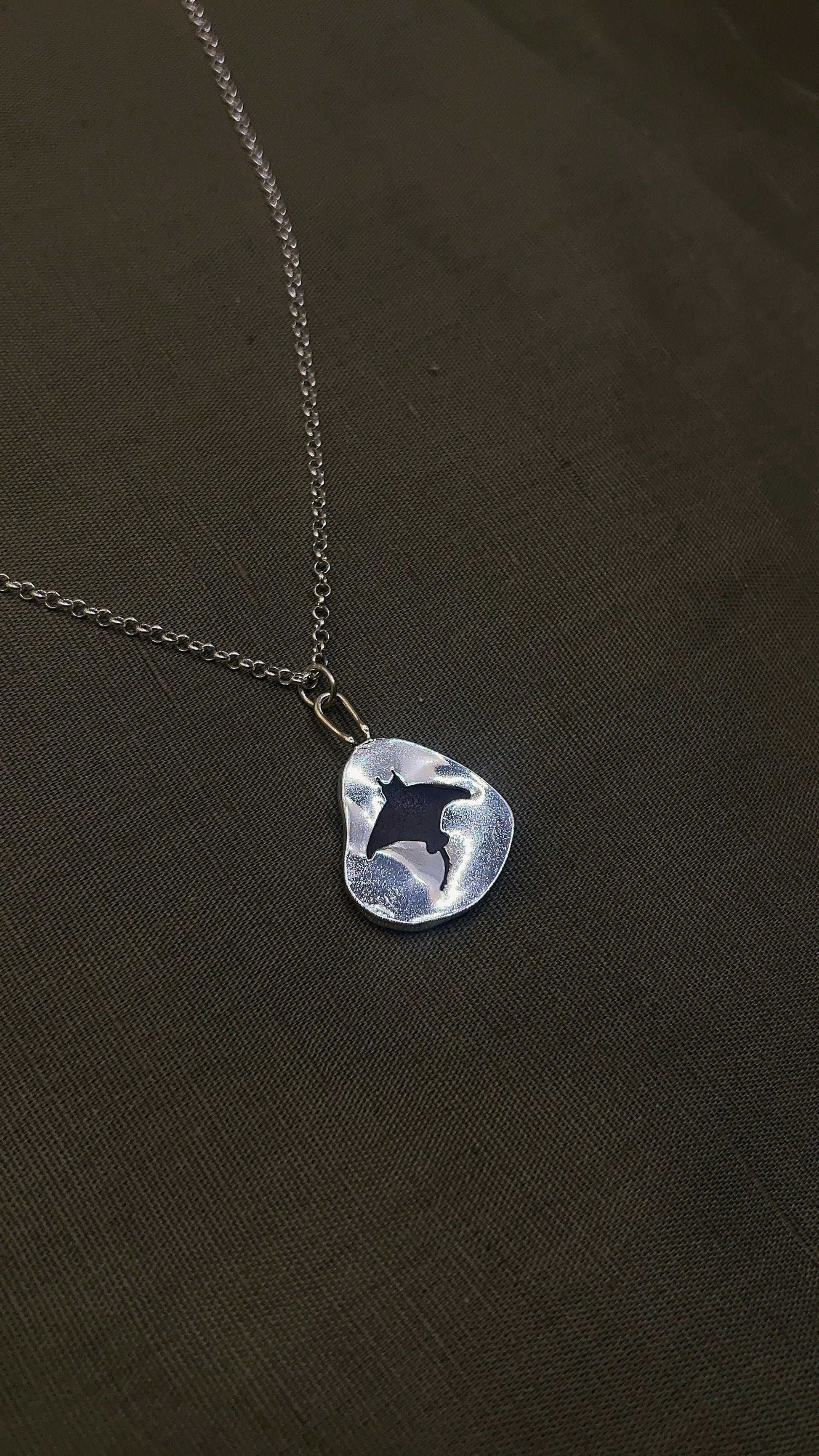 seaglass window necklace: manta ray