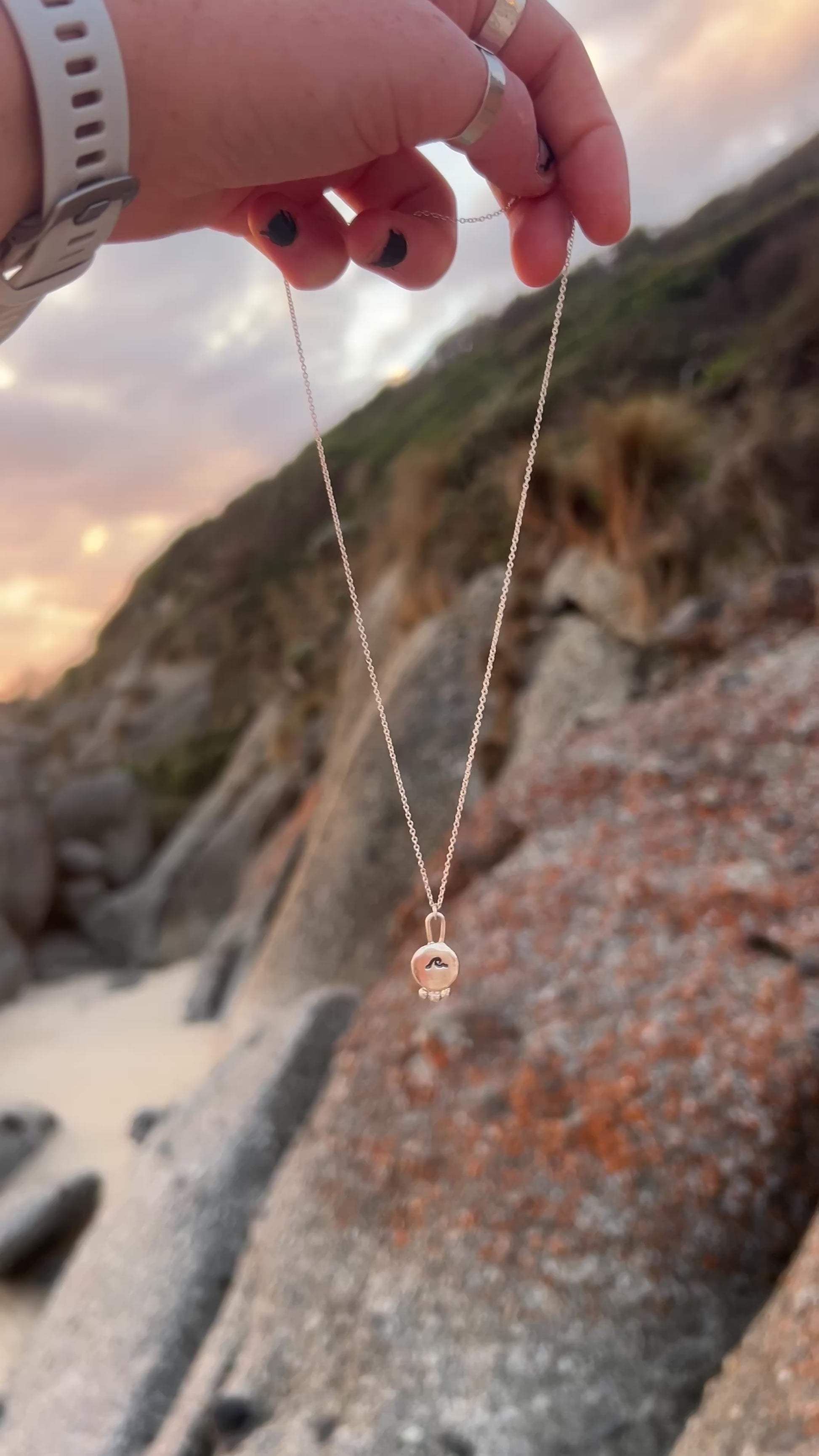 elemental wave pendant necklace